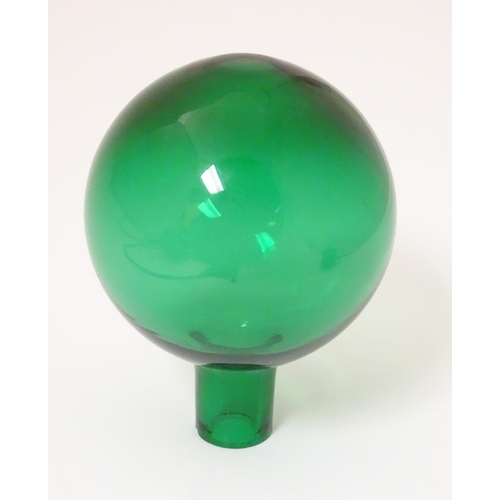 115 - A Victorian green / turquoise glass unusual Witches Ball (some say early Fire Grenade) of small size... 