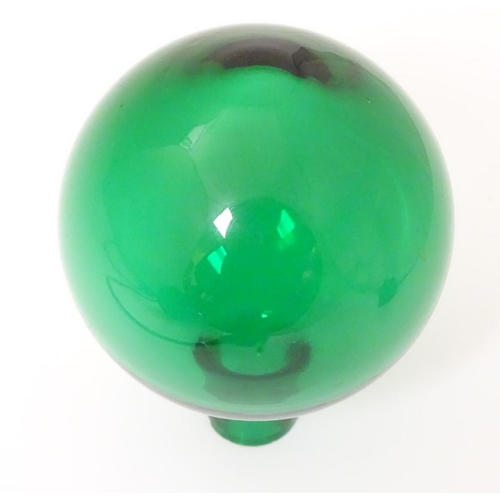 115 - A Victorian green / turquoise glass unusual Witches Ball (some say early Fire Grenade) of small size... 