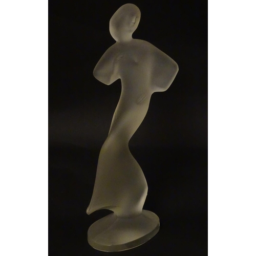 120 - An Art Deco frosted glass figure formed as a lady 8 1/4'' high