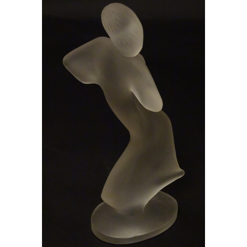 120 - An Art Deco frosted glass figure formed as a lady 8 1/4'' high