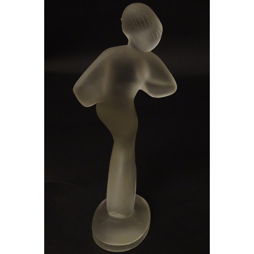 120 - An Art Deco frosted glass figure formed as a lady 8 1/4'' high