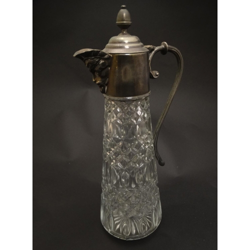 132 - A glass claret jug  with silver plate handle and mounts 11 1/2'' high overall