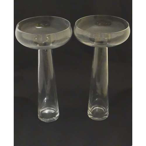 135 - Pair of glass vases: a pair of clear tall glass vases, with polished pontil scars, of champagne sauc... 