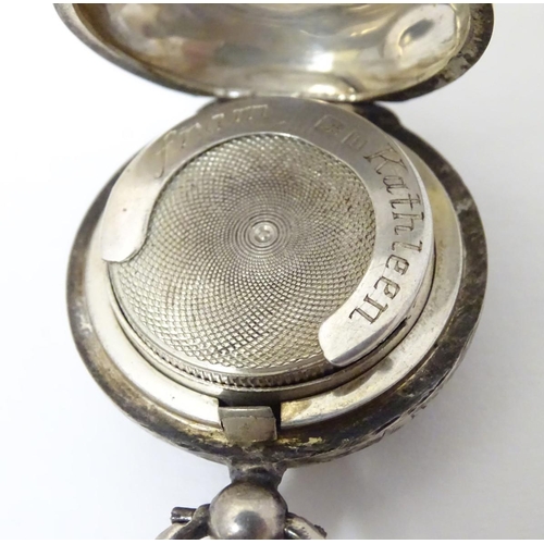 145 - A silver sovereign case with engraved acanthus scroll decoration. Hallmarked Birmingham 1912 maker W... 