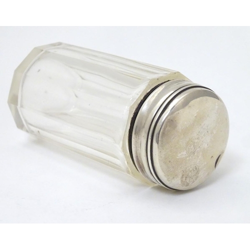 147 - A glass jar with silver top 3 1/4'' high