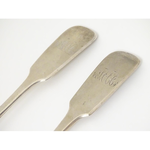 149 - A Victorian pair of silver fiddle pattern serving spoons hallmarked London 1841 maker Robert William... 