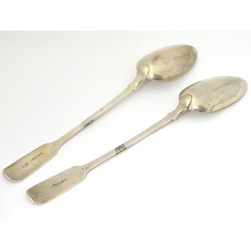 149 - A Victorian pair of silver fiddle pattern serving spoons hallmarked London 1841 maker Robert William... 