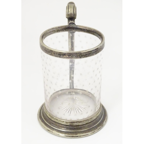 151 - A cut glass cruet bottle with silver mount hallmarked London 1857 together with a A cut glass tankar... 