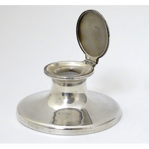 153 - A silver capstan formed inkwell hallmarked Birmingham 1913 maker Henry Clifford Davis.