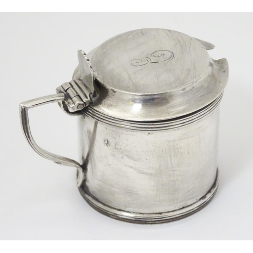 161 - A silver mustard pot hallmarked Birmingham 1912 maker William Hutton & Sons ltd Approx 2'' high