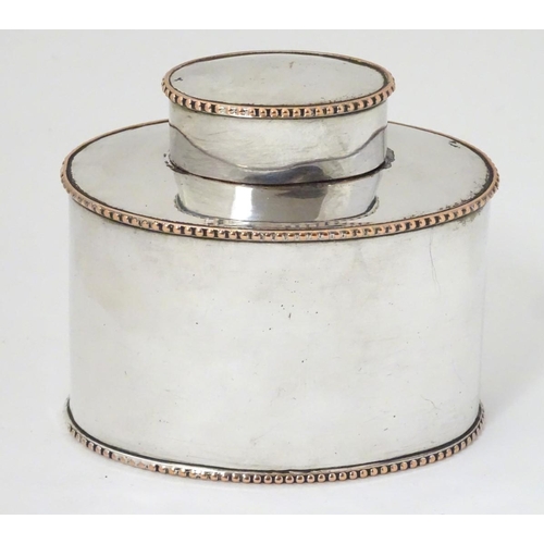 164 - An Old Sheffield plate tea caddy of ovoid form. 3 1/2'' x 3''