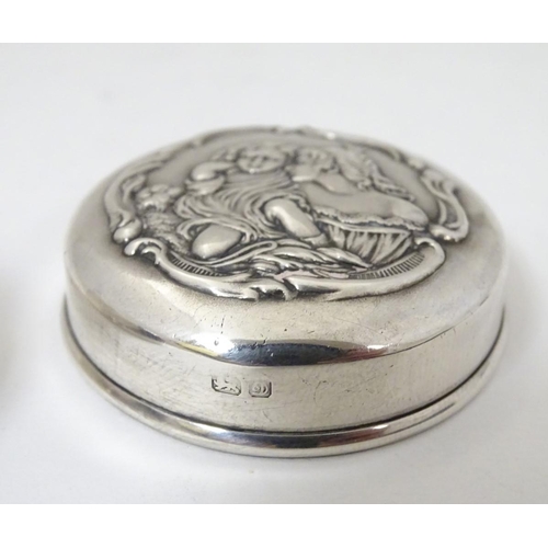 166 - A silver pot with embossed decoration to lid depicting mother and child. Hallmarked Chester 1904 mak... 