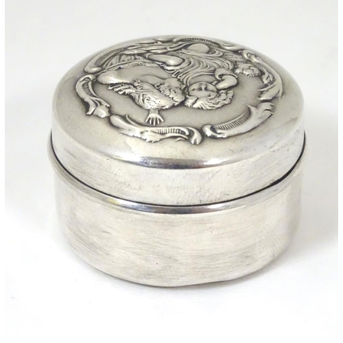 166 - A silver pot with embossed decoration to lid depicting mother and child. Hallmarked Chester 1904 mak... 