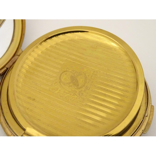 172 - A vintage Stratton powder compact  with crown emblem to top. 3'' diameter