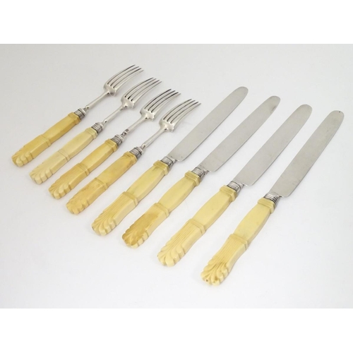 177 - 4 + 4 silver fruit knives and forks with ivory handles hallmarked 1818 maker JL. Approx  7 3/4''