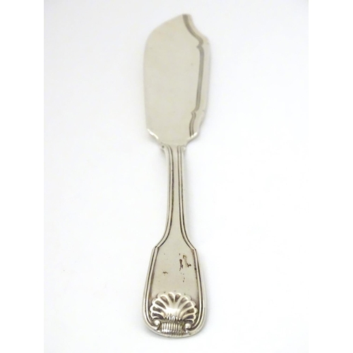 179 - A Victorian silver fiddle shell and thread pattern butter knife hallmarked London 1841. 8'' long (56... 