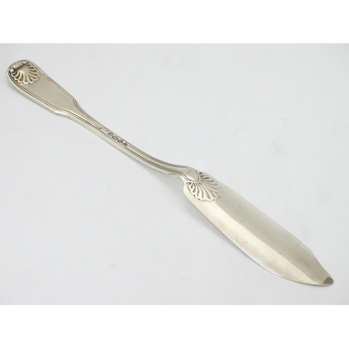 179 - A Victorian silver fiddle shell and thread pattern butter knife hallmarked London 1841. 8'' long (56... 