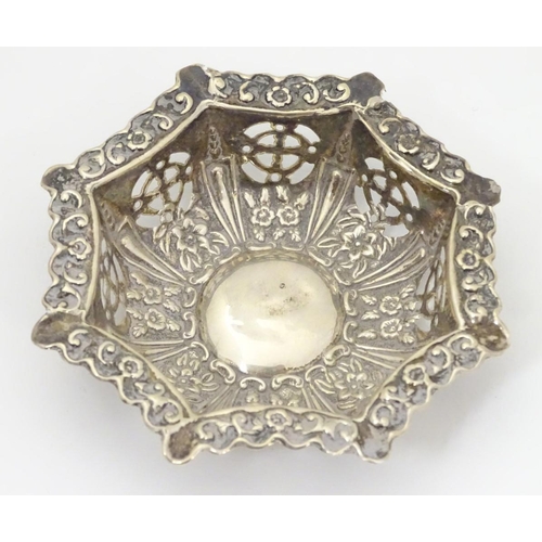 185 - A silver bon bon dish with embossed and pierced decoration. Hallmarked Birmingham 1903 maker CP & Co... 