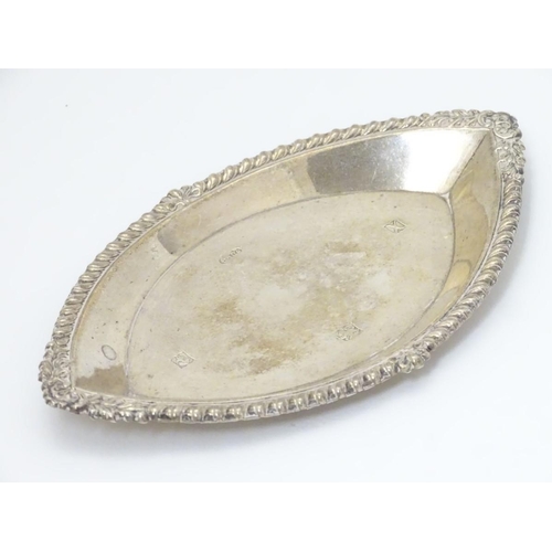 188 - A silver pin dish of lozenge form with gardrooned border. Hallmarked Birmingham 1972 maker B & Co. 5... 