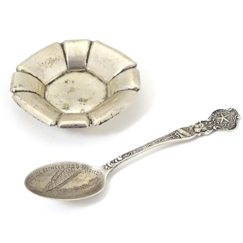 191 - An American silver souvenir spoon for Texas, depicting lone star, Texan cow, engraved detail of Eagl... 