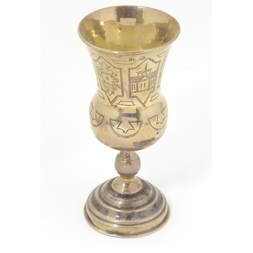 193 - A Russian silver kiddush cup with engraved decoration and bearing marks for Moscow, Assay master AP ... 