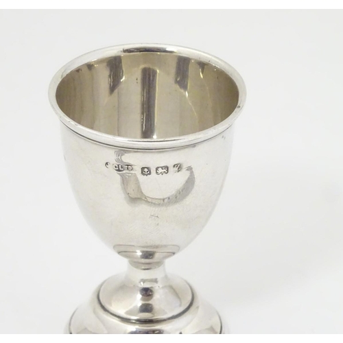 197 - A silver pedestal egg cup hallmarked Birmingham 1924 maker Joseph Gloster Ltd. together with a silve... 