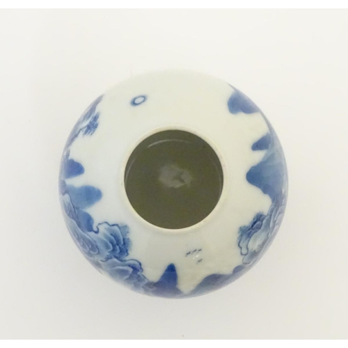 20 - A small Chinese blue and white vase, decorated with a landscape to include mountains, bridges, boats... 