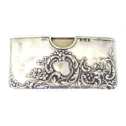 200 - A silver card case with embossed decoration. Hallmarked Birmingham 1903 maker Sydney & Co. 3'' wide ... 