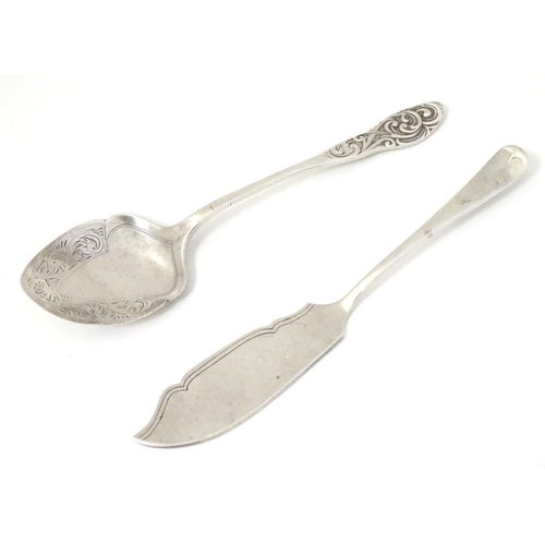 201 - A silver butter knife hallmarked Sheffield 1901 together with a silver preserve spoon (2) (36g)