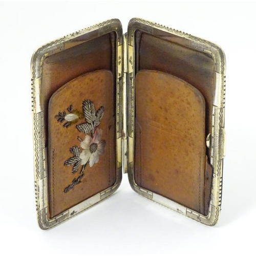 202 - A late 19thC / early 20thC leather purse / card case with gilt metal mounts. 3 3/4'' x 2 1/2''