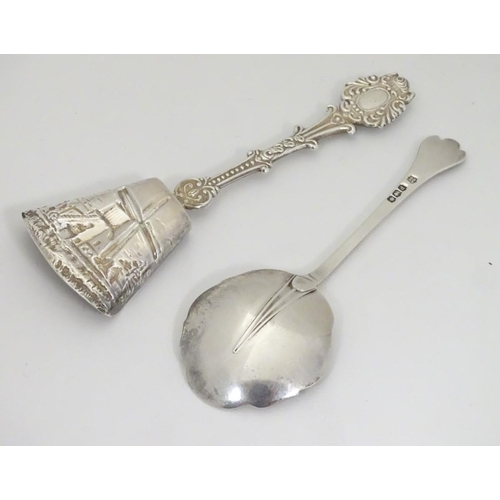 203 - A silver spoon with trefid handle hallmarked Sheffield 1921 maker James Deakin & Sons 4 3/4'' long. ... 