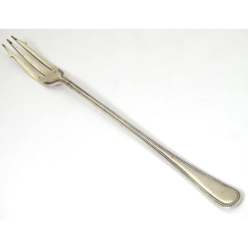 205 - A silver pickle fork hallmarked Sheffield 1907 maker Francis Howard   7 1/4'' long (30g)