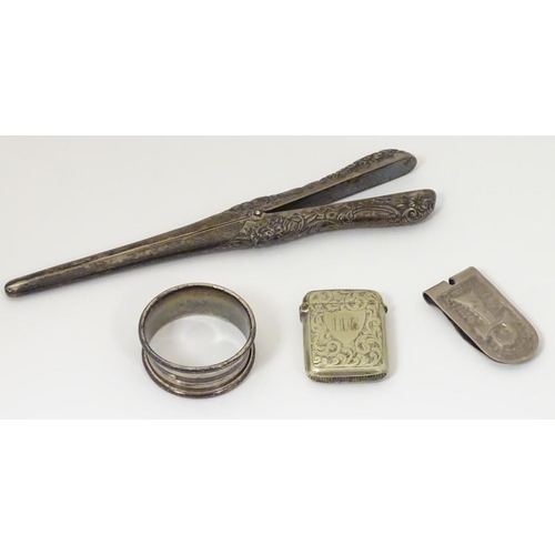 208 - Assorted items to include American silver glove stretchers by Gorham Manufacturing Co. A napkin ring... 