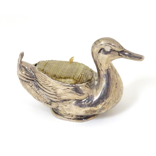 209 - A novelty silver pin cushion formed as a duck. Hallmarked Birmingham 1911 maker Crisford & Norris 2 ... 