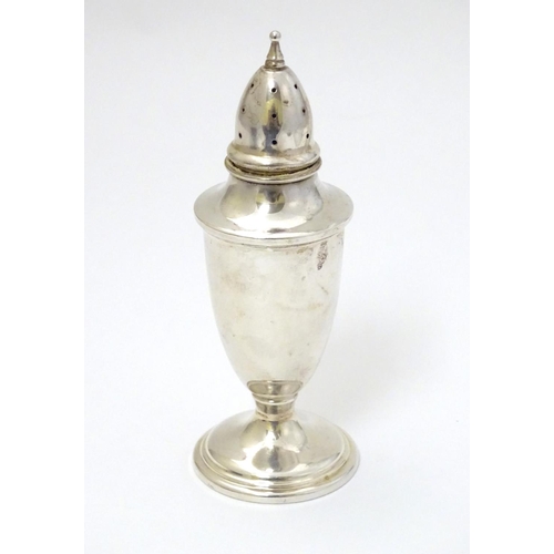 214 - An American silver pepperette approx 4 3/4'' high (32g)