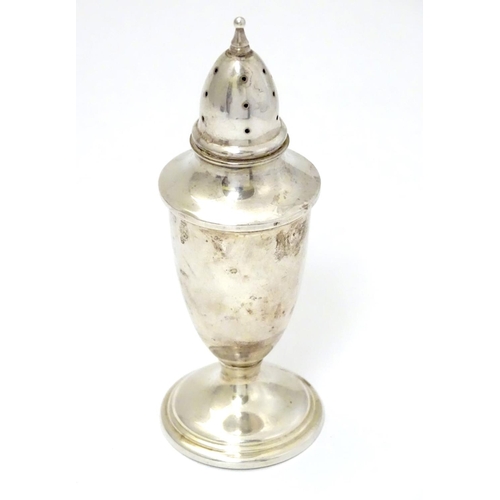 214 - An American silver pepperette approx 4 3/4'' high (32g)