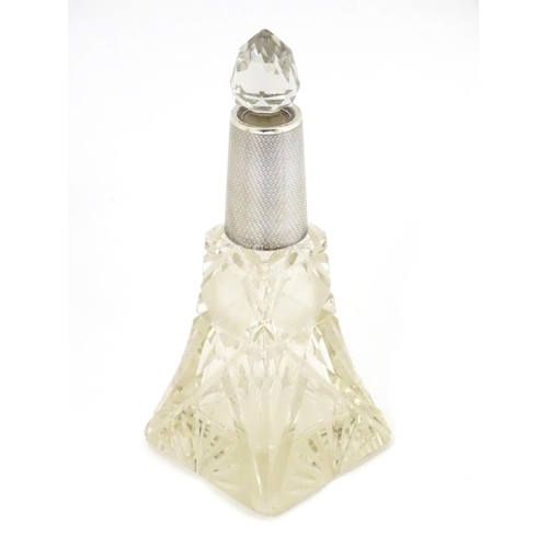 227 - A cut glass scent / perfume bottle with silver collar hallmarked Birmingham 1926 maker Horton & Alld... 