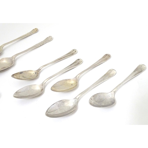 228 - 5 silver teaspoons hallmarked Sheffield 1932 maker Viner's Ltd. A small pair of tongs with birds cla... 