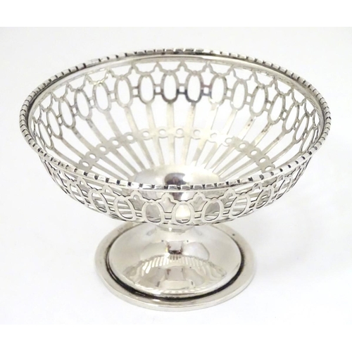 234 - A white metal bon bon dish with pierced decoration. approx 4'' diameter