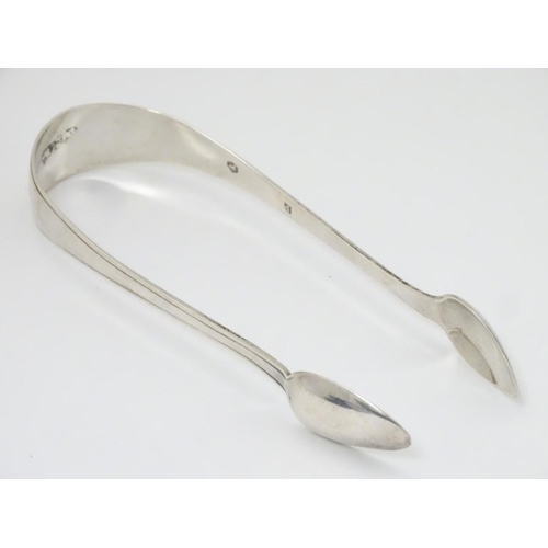 239 - Dutch silver sugar tongs approx 5 ¼'' long. (28g)