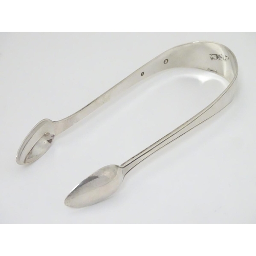 239 - Dutch silver sugar tongs approx 5 ¼'' long. (28g)