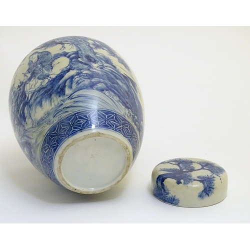 4 - A large blue and white Japanese lidded ginger jar decorated with a sage sat by a tree in a landscape... 