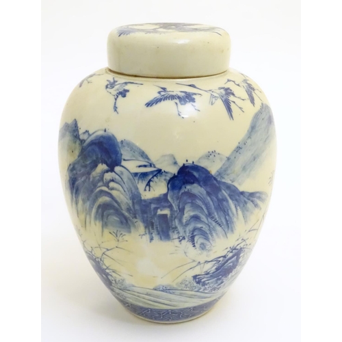 4 - A large blue and white Japanese lidded ginger jar decorated with a sage sat by a tree in a landscape... 