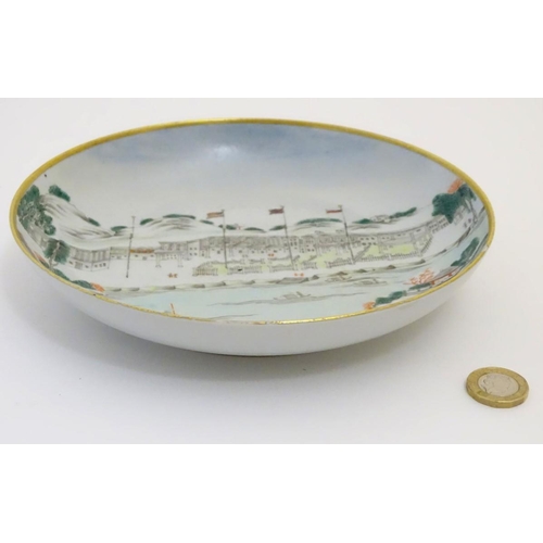 50 - A Chinese export plate / dish depicting the Hongs at Canton, Thirteen Factories, or Canton Factories... 