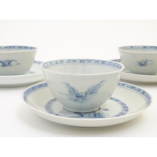 63 - A set of six 18thC Chinese Nanking Cargo blue and white tea bowls and saucers, decorated with pine t... 