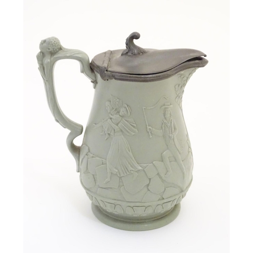 69 - A stoneware pitcher with hinged lid by E. Ridway & Abington, with moulded relief decoration of anti-... 