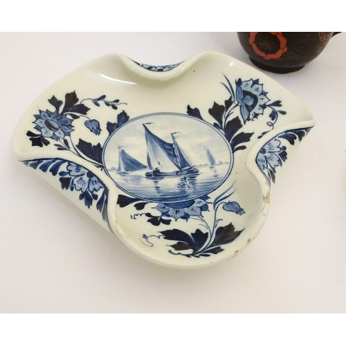 92 - A quantity of ceramic items to include a blue and white Chinese rice bowl, with character marks unde... 