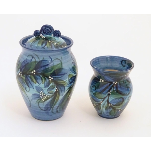 97 - Two items of Welsh Gwili studio pottery by Pru Green, to include a hand painted lidded pot and match... 