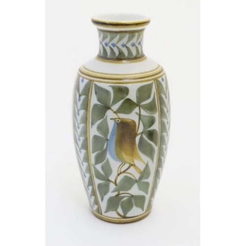 98 - A Laurence McGowan British studio pottery vase decorated with blue bellied birds and foliage. Monogr... 