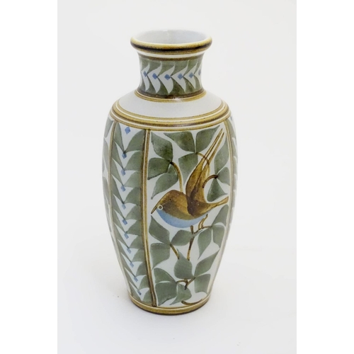 98 - A Laurence McGowan British studio pottery vase decorated with blue bellied birds and foliage. Monogr... 